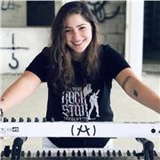 Pianist, Piano teacher with 6 years teaching experience, singer, songwriter, composer and music producer. I teach in English and French